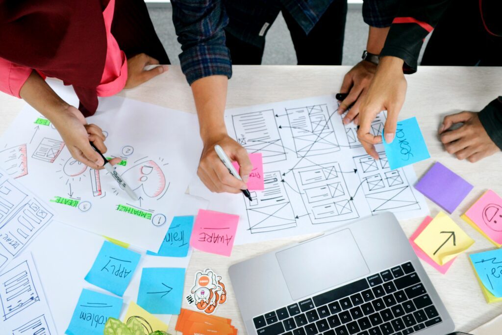 Group of people writing on paper